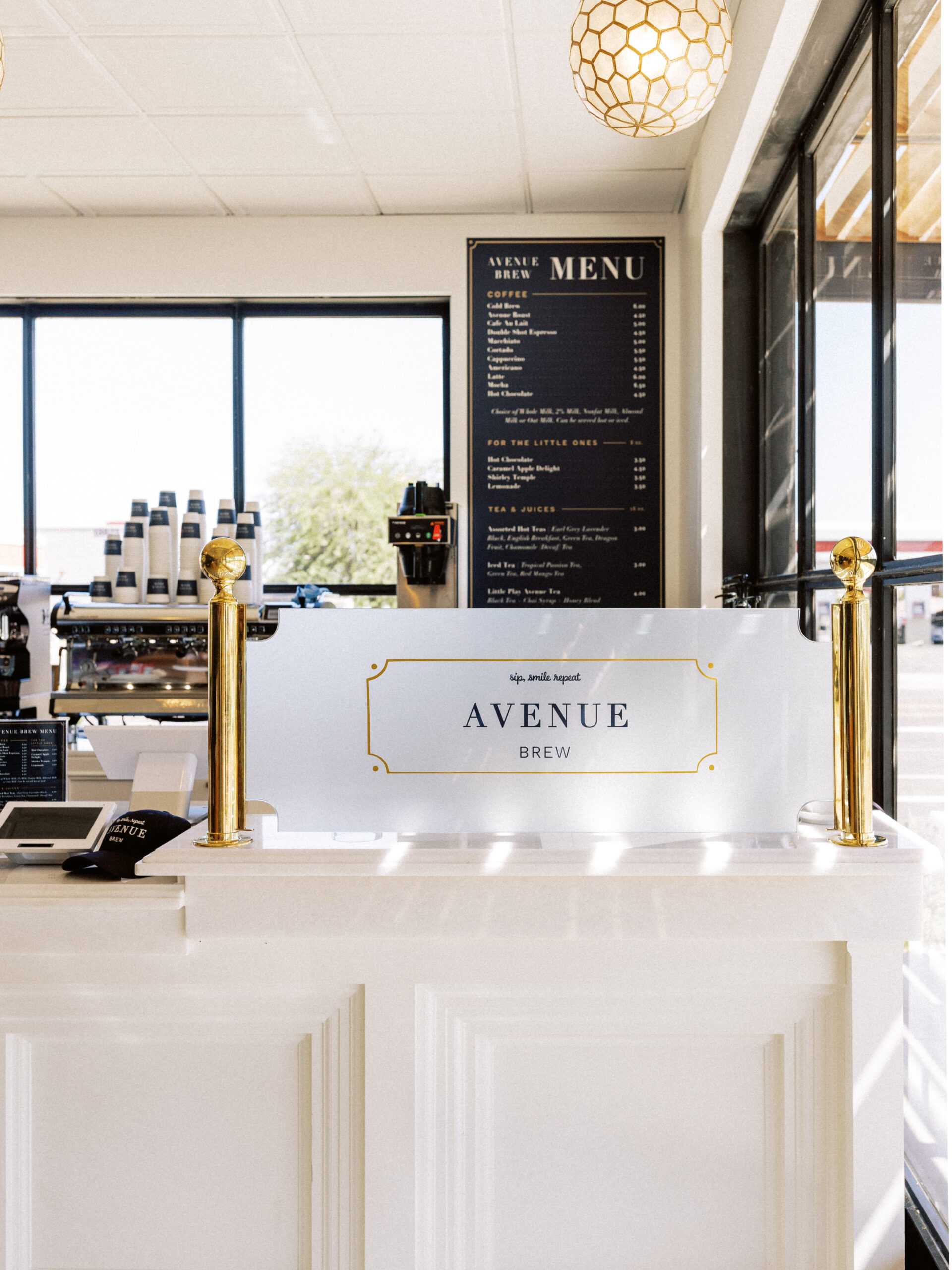 Avenue Brew pastry and coffee pairing on marble table